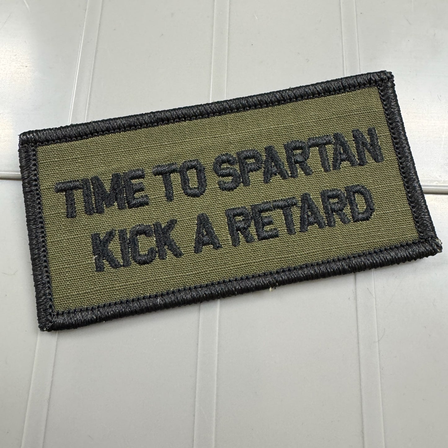 As Seen on Socials - Time To Spartan Kick A Retard - 2x4 Patch - Olive Drab w/Black