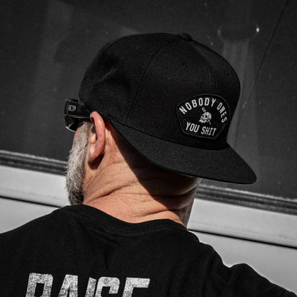 Nobody Owes Your Shit Arched Patch Flatbill SnapBack Hat