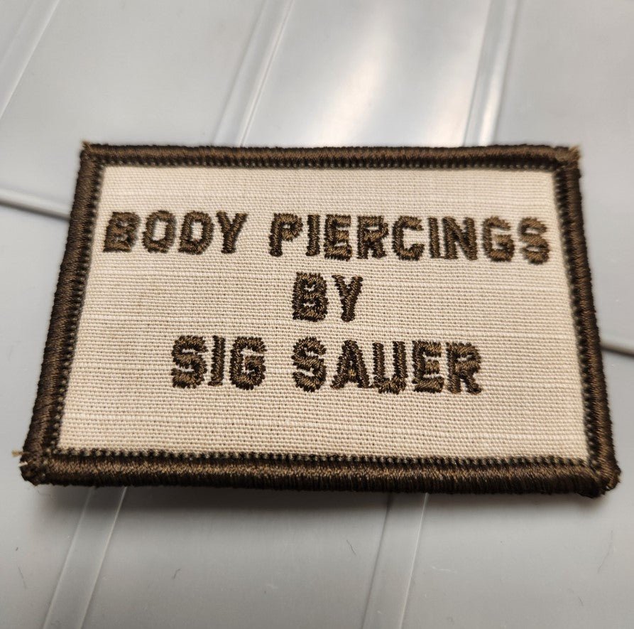 As Seen on Socials - Body Piercings By Sig Sauer - 2x3 Patch - Desert Tan w/Coyote